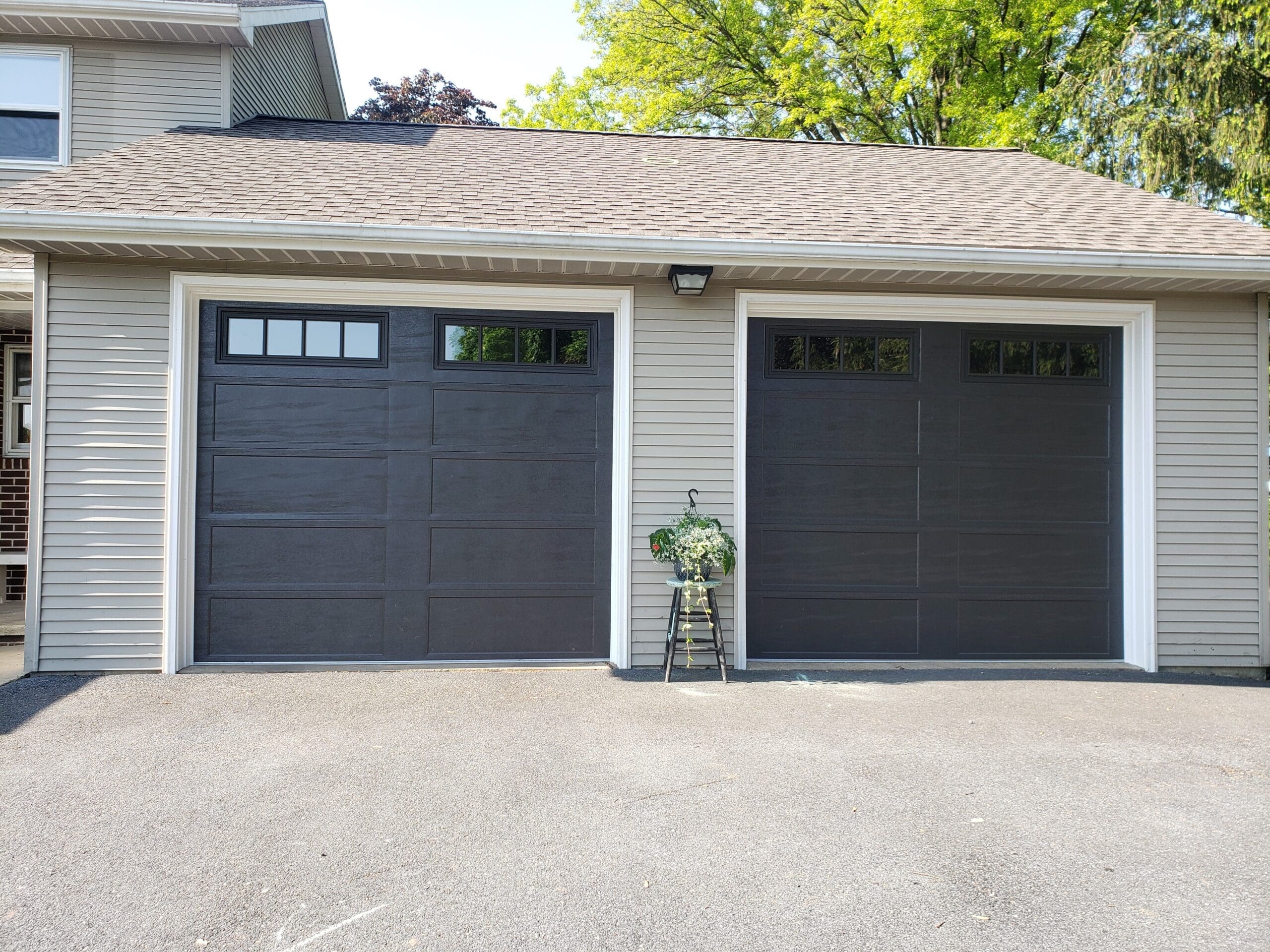 black double-door garage