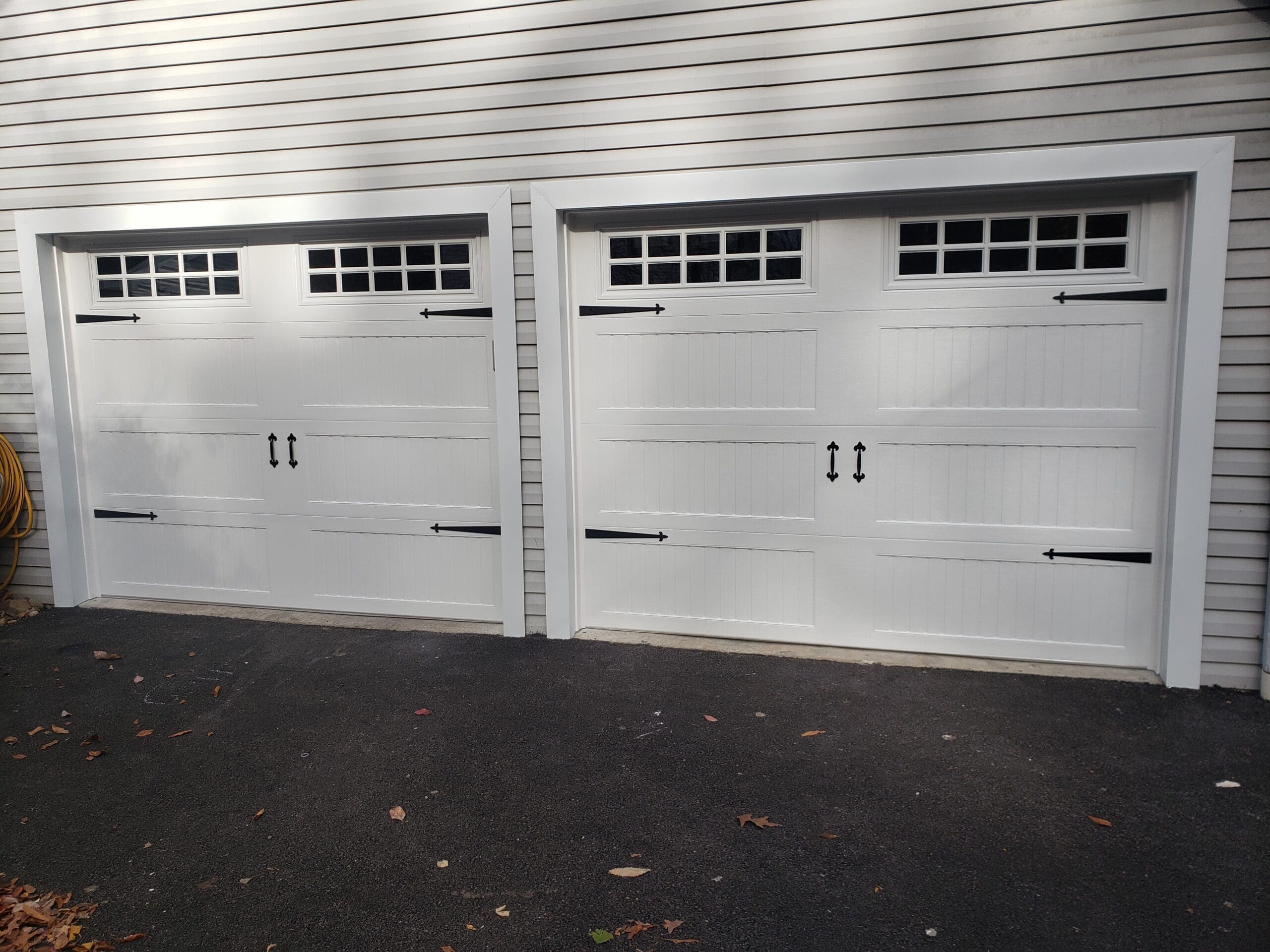 white double-door garage